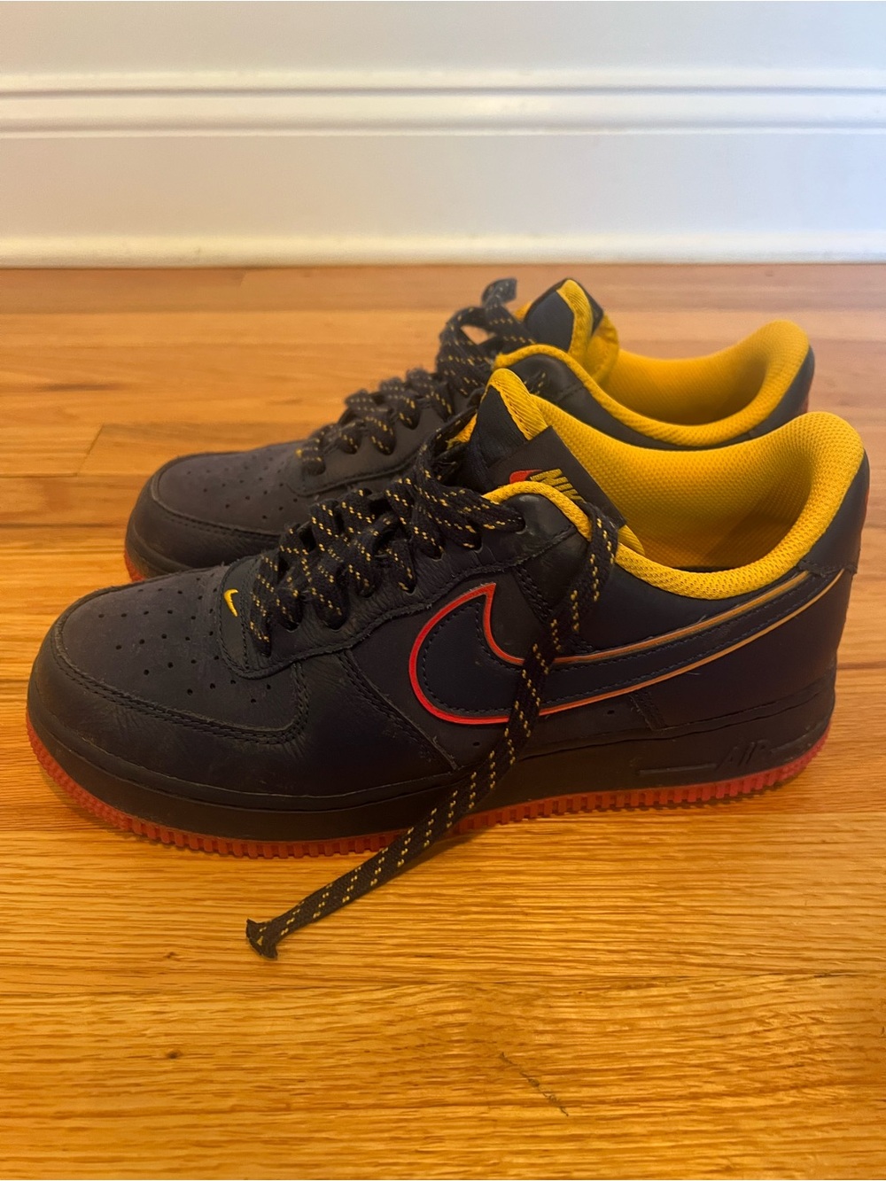 Nike Men’s Navy Black Sneakers with Yellow Lining and Red Swoosh